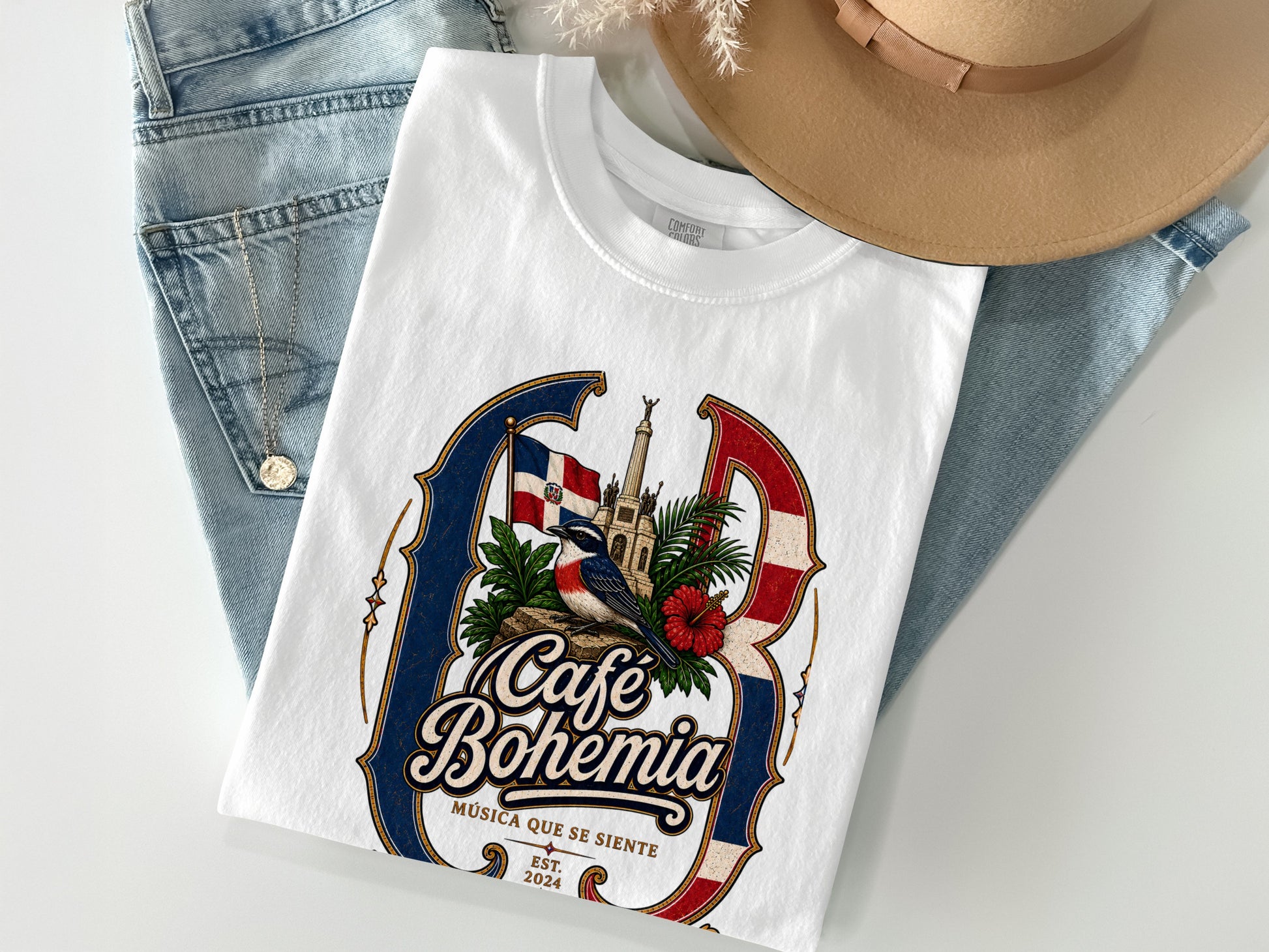 White short-sleeve t-shirt featuring "Café Bohemia Música Que Se Siente" text and graphic.