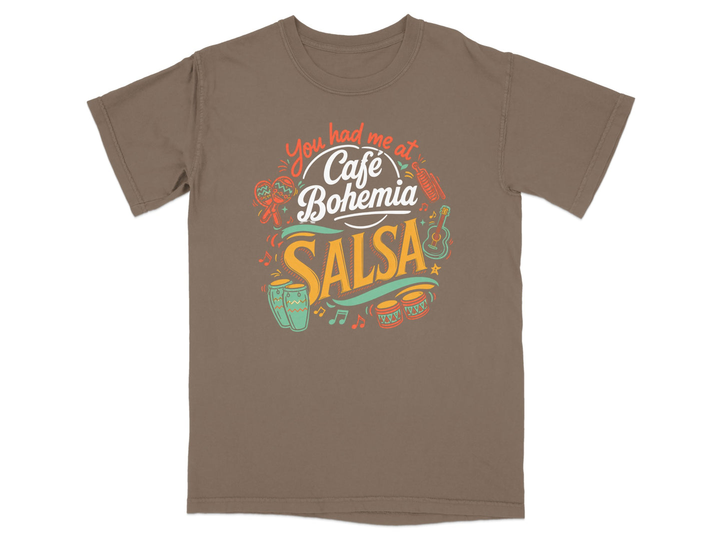 Brown t-shirt with "You had me at Cafe Bohemia Salsa" text and instruments.