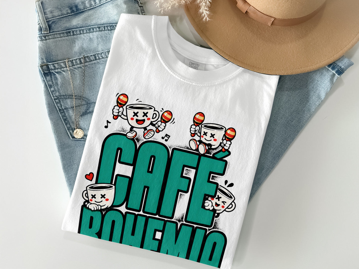 White t-shirt with "CAFÉ BOHEMIA" text and cartoon coffee cups with maracas.